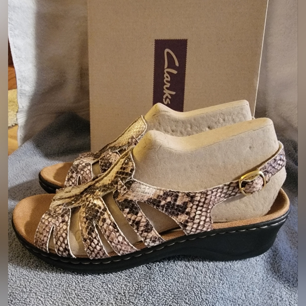 Like New-Clarks sandals. cool snakeskin print and comfy wedge sole. Size 8.5 - Picture 3 of 8